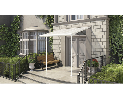 Entrée d''une maison avec un auvent de porte blanc et un banc.