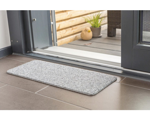 Paillasson devant une porte de terrasse