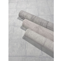 Trois rouleaux de papier peint intissé gris avec motif