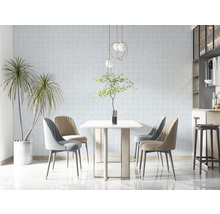 Salle à manger avec table, chaises, suspension et plantes d''intérieur pour une ambiance lumineuse et moderne.