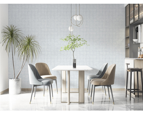 Salle à manger avec table, chaises, suspension et plantes d''intérieur pour une ambiance lumineuse et moderne.