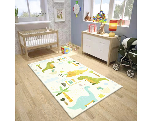Chambre d''enfant avec lit de bébé, commode, poussette et tapis de jeu motif dinosaure