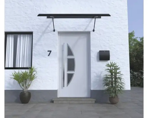 Entrée d''une maison avec un auvent de porte d''entrée