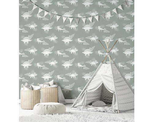 Chambre d''enfant avec papier peint dinosaures, tente de jeu, paniers et pouf