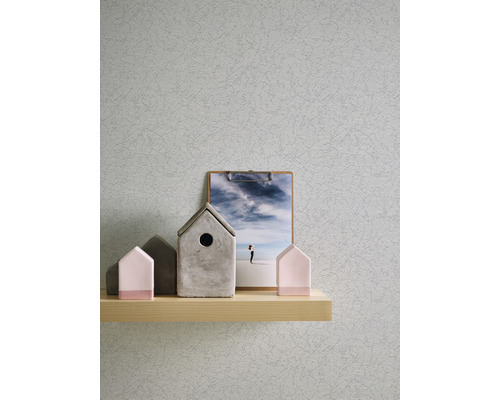 Papier ingrain clair avec décoration sur une étagère
