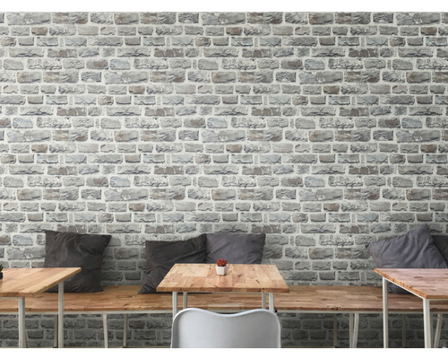 Décoration murale avec papier peint à motif de mur de pierre au-dessus du coin salon