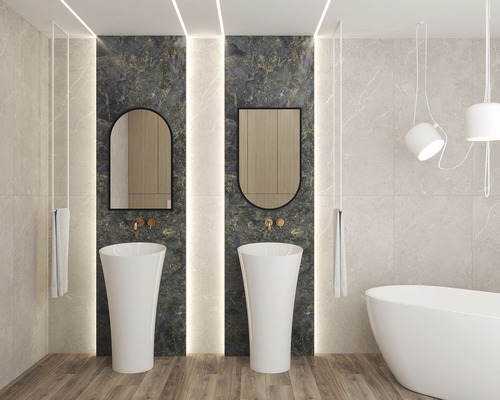 Salle de bain lumineuse avec deux lavabos, miroirs, baignoire et éclairage