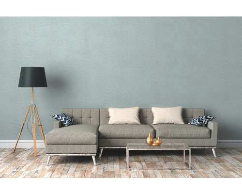 Wohnzimmer mit grauer Couch, Stehlampe und Holzboden