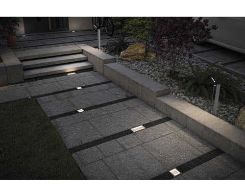 Extérieur avec pavés et spots de sol encastrés