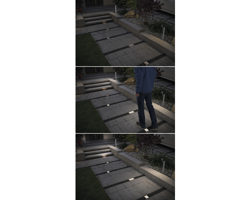 Espace extérieur avec spots de sol pour éclairer les chemins et les marches