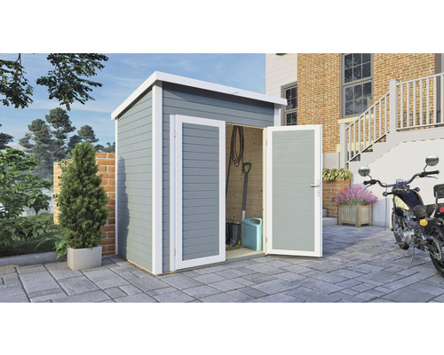 Abri de jardin avec portes doubles ouvertes sur une surface pavée