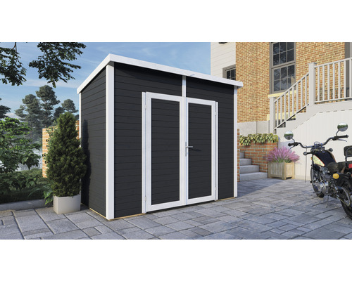 Abri de jardin en bois avec double porte devant une maison
