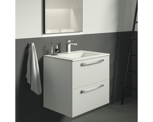 Meuble sous-lavabo avec deux tiroirs, lavabo, miroir et robinet dans la salle de bain