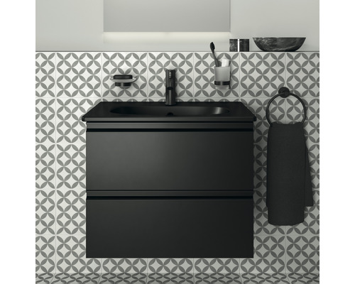Salle de bain moderne avec meuble sous-vasque noir et carrelage à motifs