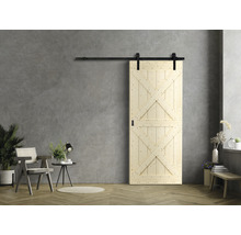 Porte coulissante en bois avec rail noir dans la pièce