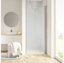 Salle de bain moderne avec paroi de douche, lavabo et miroir