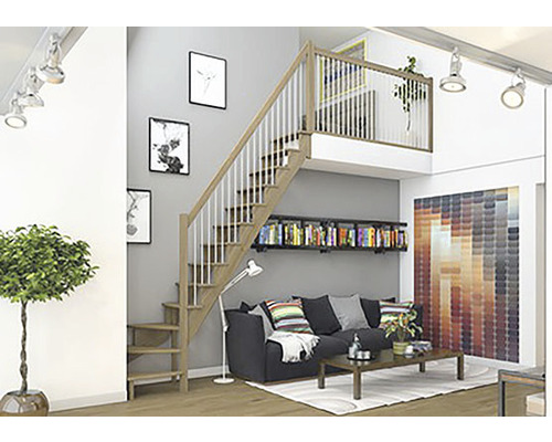 Salon avec escalier en bois, bibliothèque et coin salon.