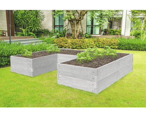 Zwei graue Hochbeete im Garten mit Pflanzen