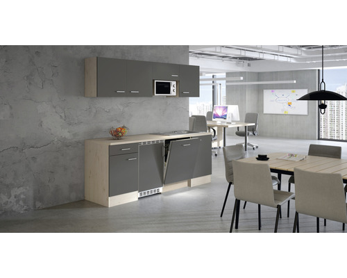 Cuisine de bureau avec lave-vaisselle, micro-ondes et éléments hauts dans un bureau lumineux et moderne