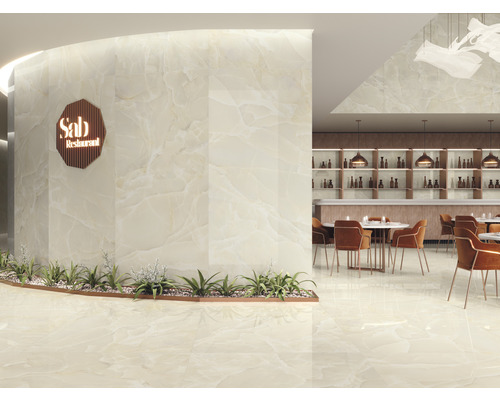 Innenansicht eines Restaurants mit Fliesenboden und Wandfliesen