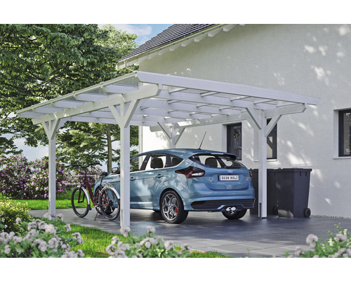 Carport individuel SKAN HOLZ Odenwald avec ancre de poteau 428 x 541 cm blanc Carport en bois blanc avec voiture et vélo dans le jardin.