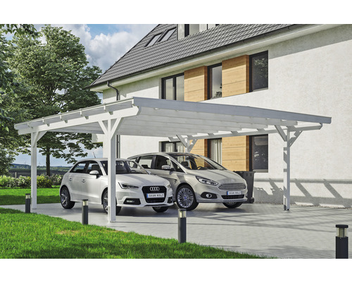 Carport double SKAN HOLZ Odenwald avec ancre de poteau 640 x 648 cm blanc Double abri de voiture en bois avec deux voitures garées devant une maison