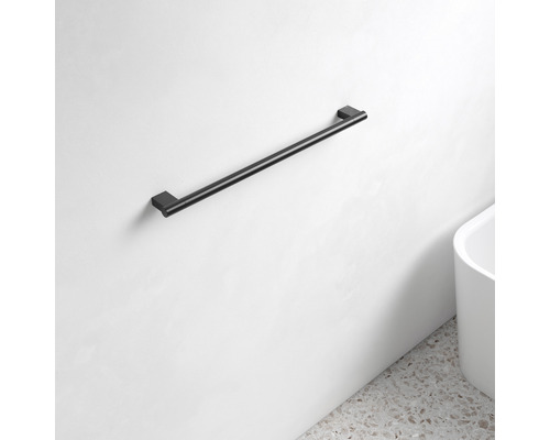 Porte-serviettes noir monté sur un mur.