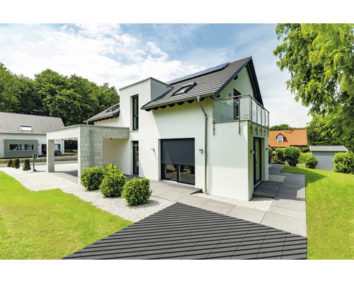 Vue d''une maison moderne avec volet roulant, terrasse et jardin