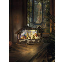 Crèche de Noël avec personnages et étable sur une table