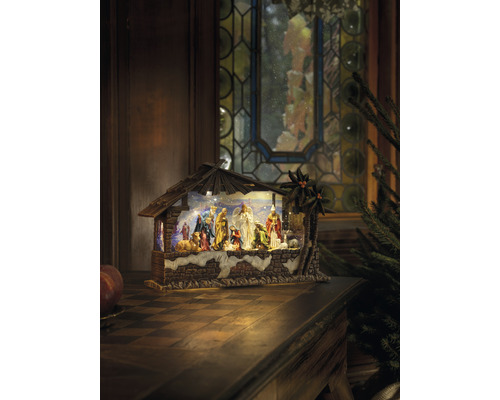 Crèche de Noël avec personnages et étable sur une table