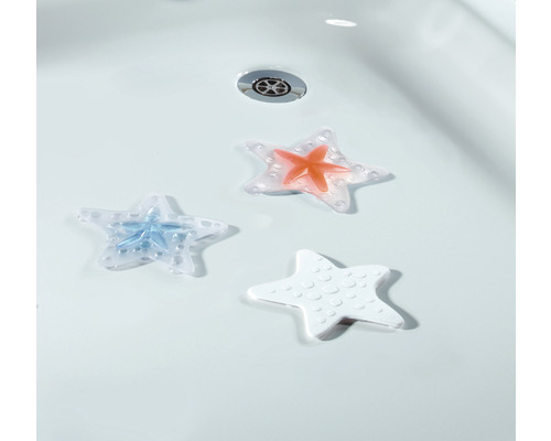 Drei Anti-Rutsch-Aufkleber in Form von Seesternen im Waschbecken
