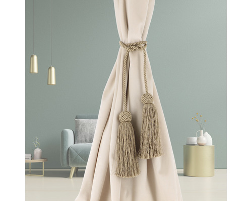 Rideau décoratif avec pompon pour la décoration des espaces de vie.