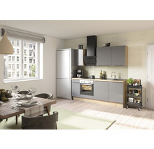Coin repas lumineux avec kitchenette et table à manger.