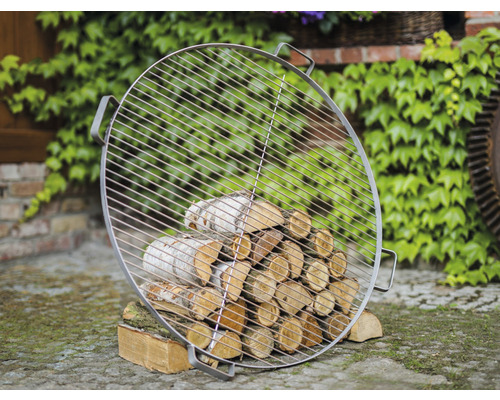 Grille de barbecue ronde avec bûches de bois