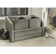 Geflochtene Gartenbank mit Staufächern und Pflanze