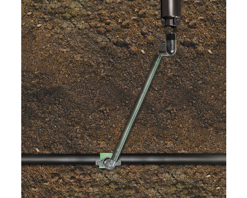 Système d''irrigation dans le sol avec tuyau et raccord