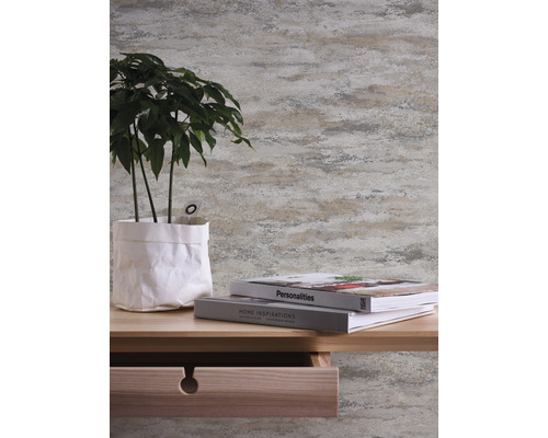 Décoration murale décorative avec plante en pot et livres sur une table en bois