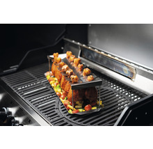 Gefüllter Hähnchenkeulenhalter auf einem Grill