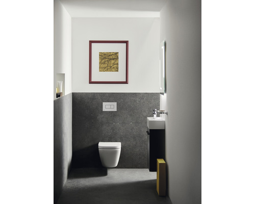 Modernes Badezimmer mit Wand-WC, Waschtisch und Spiegel