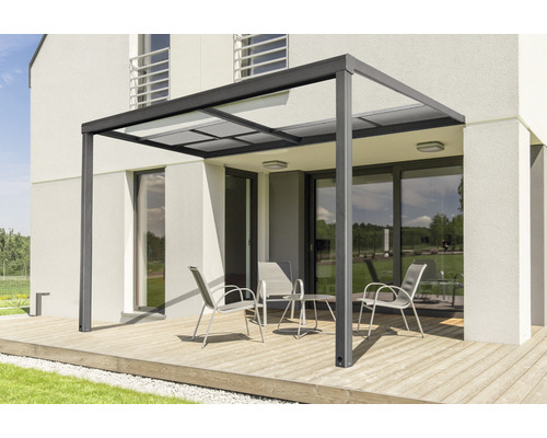 Pergola de terrasse en aluminium avec coin salon sur terrasse en bois