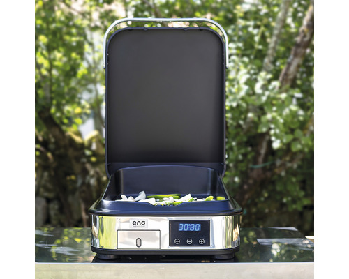 Gril de table électrique avec affichage numérique et aliments dans l''espace de cuisson