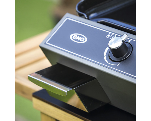 Vue détaillée d''un barbecue à gaz avec bouton rotatif et bac de récupération des graisses