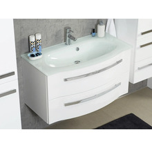 Meuble sous-lavabo blanc avec deux tiroirs et un lavabo blanc avec tablette en verre.
