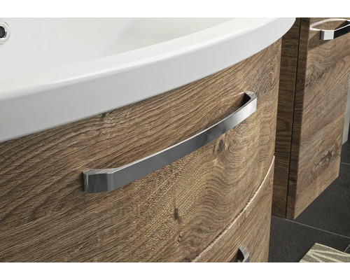 Detailansicht eines Waschtischunterschranks mit Holzdekor und Handtuchhalter