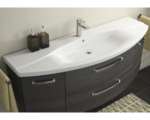 Meuble-lavabo avec armoire basse, robinet et espace de rangement pour salle de bain