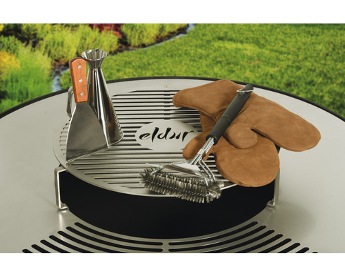 Ensemble d''ustensiles de barbecue avec spatule, burette à huile, brosse et gants de barbecue sur un barbecue rond