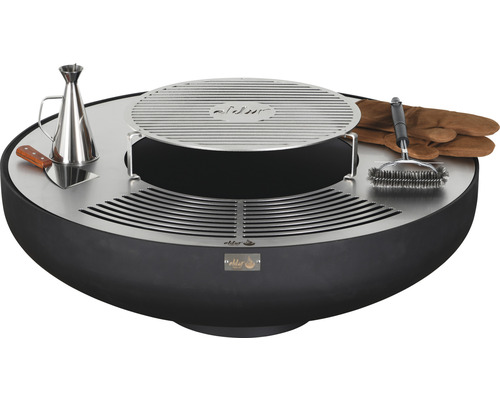 Foyer rond avec grille, ustensiles de barbecue, huilier et gants de barbecue