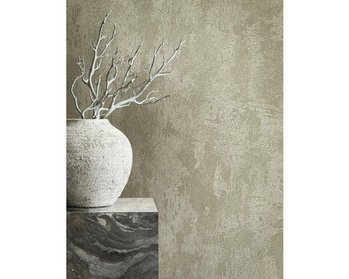 Gros plan d''un papier peint mural avec une texture en relief à côté d''un vase décoratif et de branches