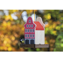 Vogelhaus im Hausdesign mit Meise