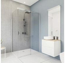 Salle de bain moderne avec cabine de douche, lavabo et miroir
